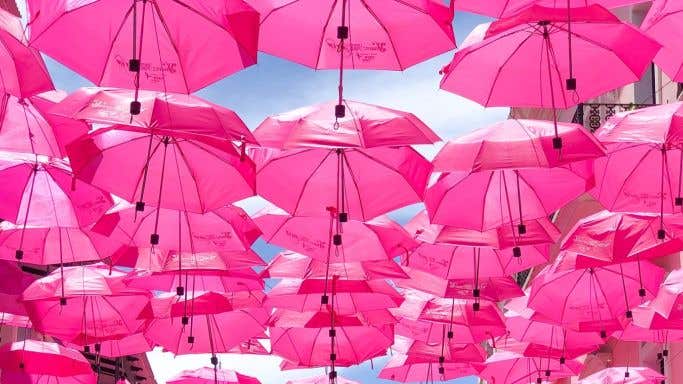 Pink umbrellas by chandler-walters-qFuKzUleXsw-unsplash