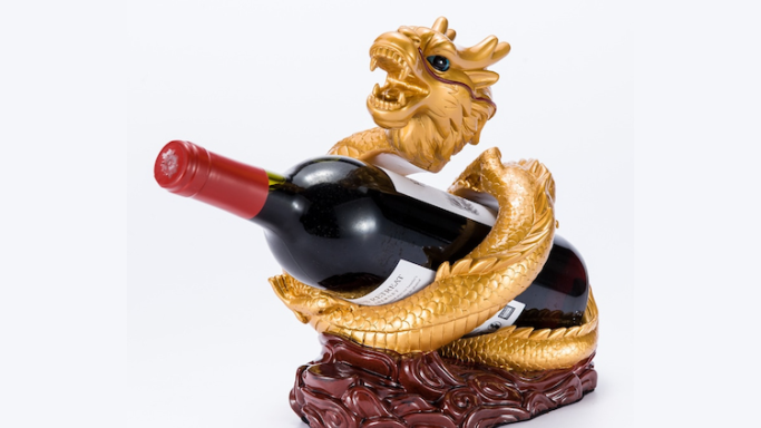 Wine bottle in dragon holder