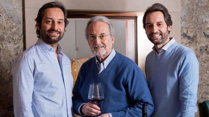 Etna winemaker Giuseppe Benanti stands between his twin sons
