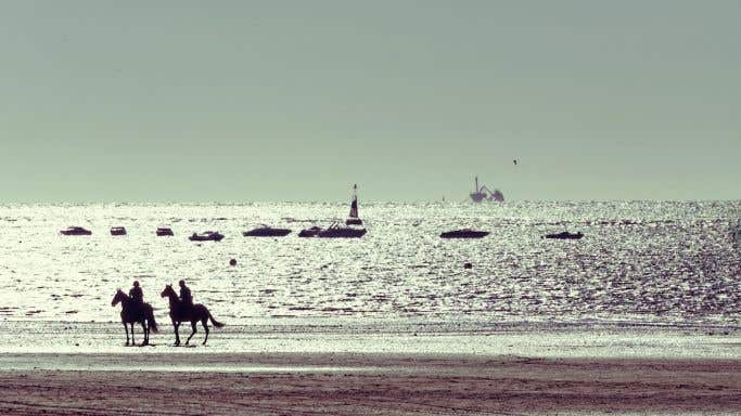 Sanlucar de Barrameda - riders on the beach