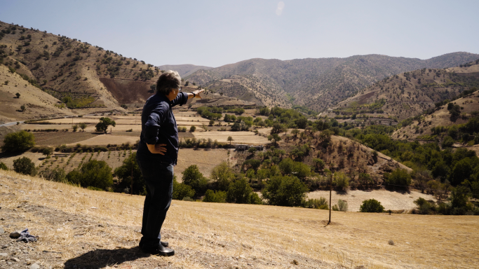 Vahe Keushguerian looks out over a dry Iranian landscape