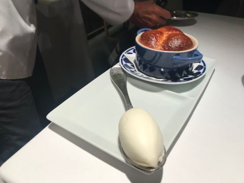 Rum baba and vanilla ice cream at Petit Comitè restaurant in Barcelona