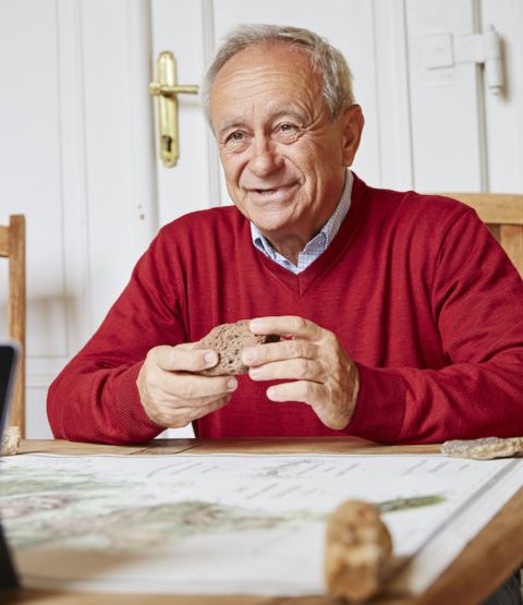 Istvan Szepsy of Tokaj with stones and map