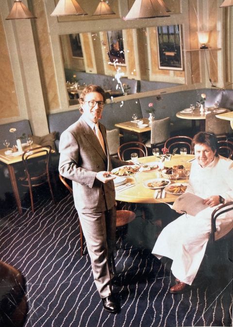 Nick Lander and Martin Lam in L'Escargot restaurant, Soho, London in the early 1980s