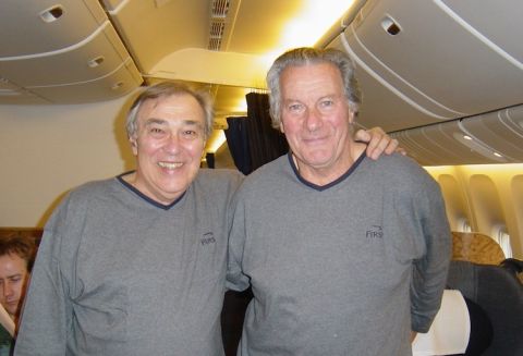 Cazes and Barton getting ready to sleep aboard a flight