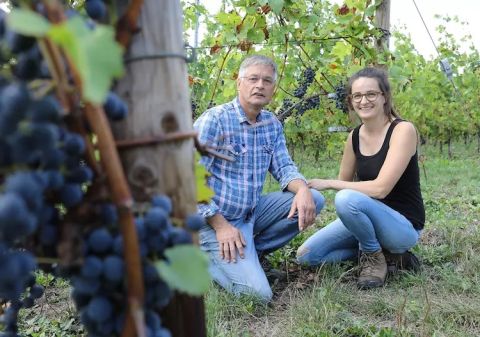 Laurent and Corinne Cox in their vineyards