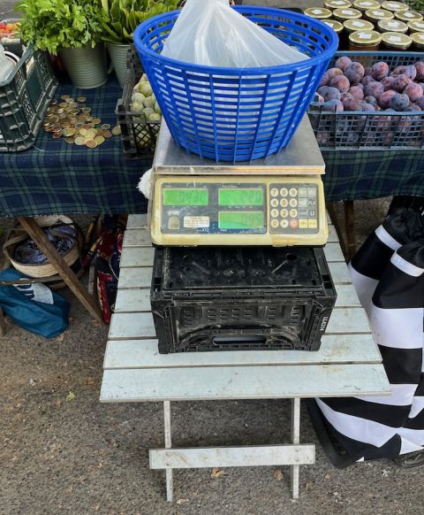 Market scales and blue basket