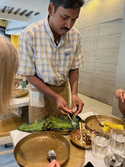 Peeling off Soam lentil pancakes from the leaves they were cooked in