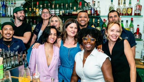 Kaitlin Wilkes with a group of bartenders at Mister Paradise; photo by William Runnels