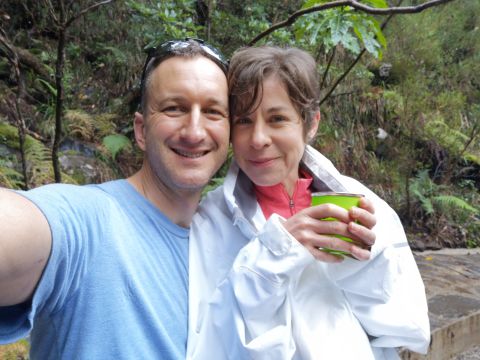 Brad and Tam Currin sipping Rainwater Madeira in the rain on the levadas