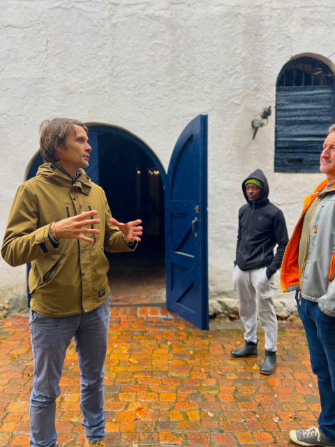 Alex Milner and Kelvin Feku at the winery door (Brad Currin to the right!)