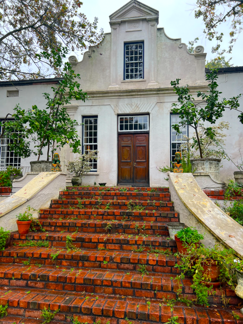 The main entrance to Natte Valleij's Cape Dutch farmhouse