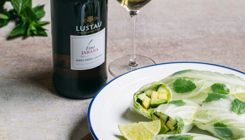 Lustau bottle, glass and spring rolls