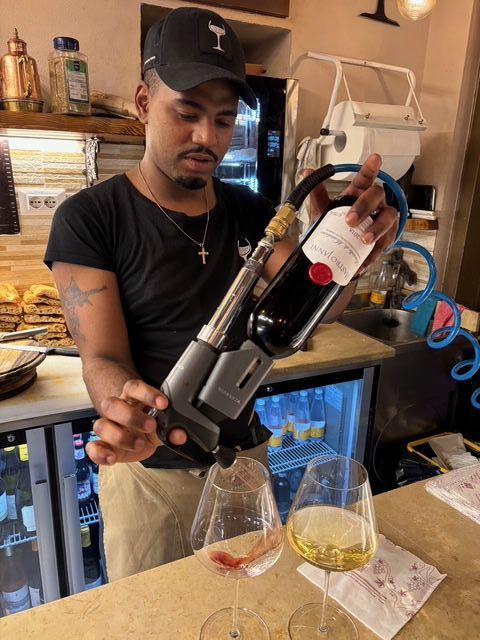 Working the Coravin at In Vino Veritas