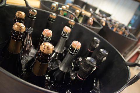 Bottles of champagne in a large ice bucket