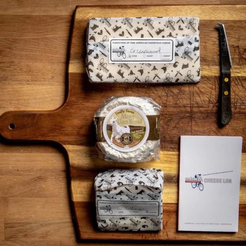 An example of a shipment from Saxelby's cheese of the month club