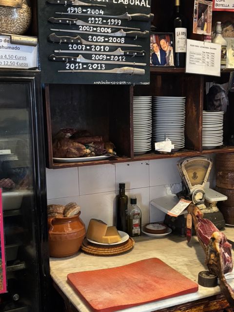Ham carving station with old carving knives at Las Teresas in Seville