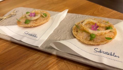 ‘tortillita’ of raw prawn meat topped with a tiny white shrimp at Sobretablas