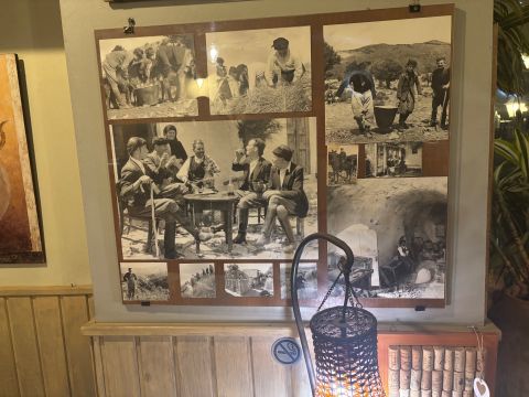 Old photos on the wall of Evgonia restaurant