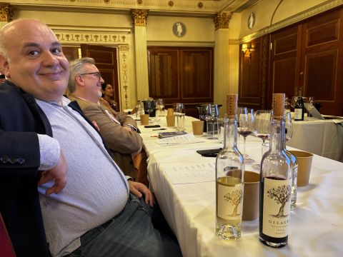 Irakli Gilauri in the City with cask samples of his wines