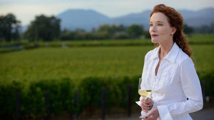 The Wine Bible - Karen MacNeil overlooking vineyard